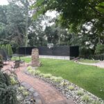 Pervious Panel Basketball Court with Retaining Wall Installation