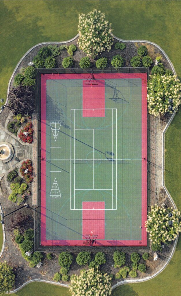 arial-view-of-residential-multi-use-court-with-landscaping-DeShayes-Dream-Courts